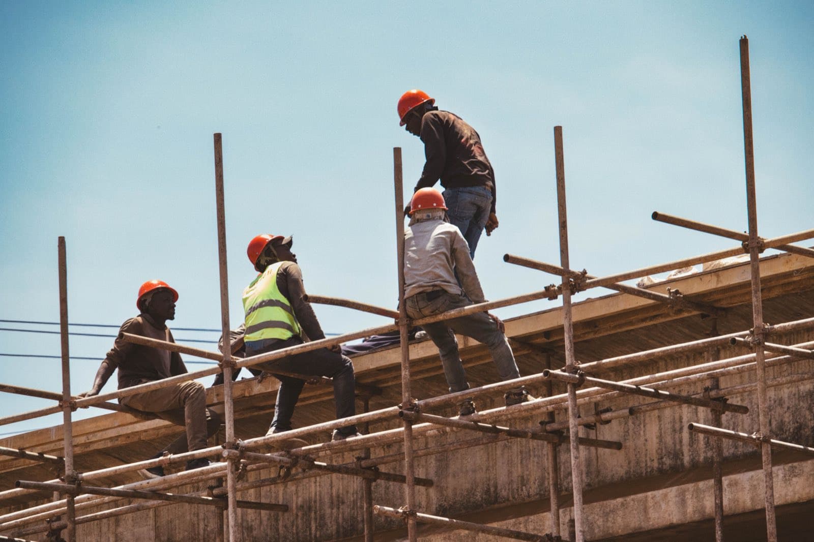 Builders at work on the scaffolding